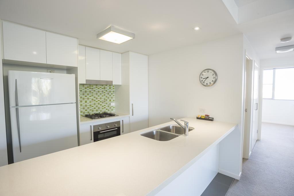 Eastwood Apartments Brisbane Exterior photo A kitchen in a typical apartment
