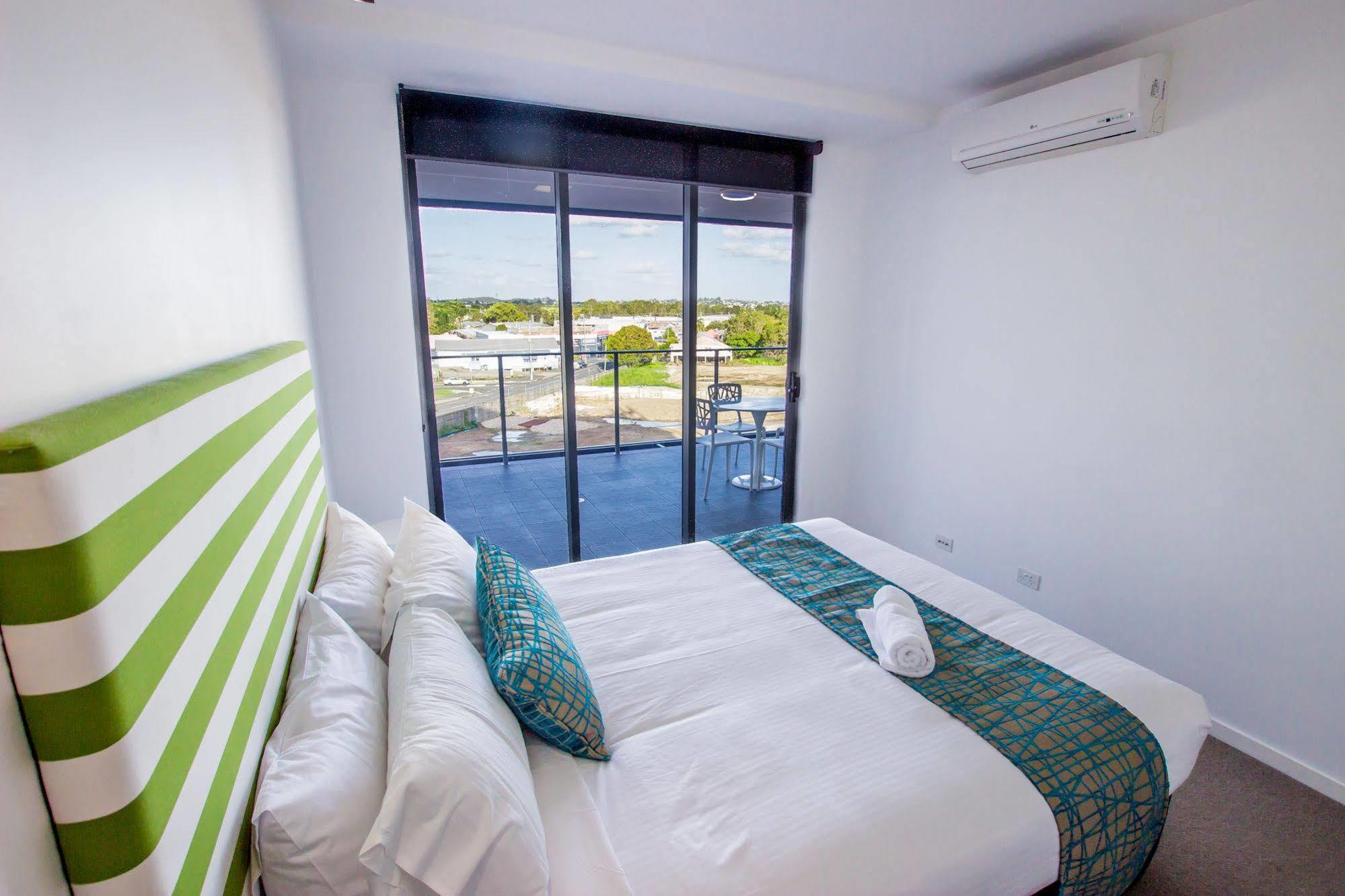 Eastwood Apartments Brisbane Exterior photo A bedroom at the hotel
